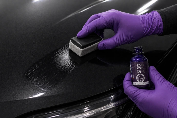 Applying a ceramic coating.